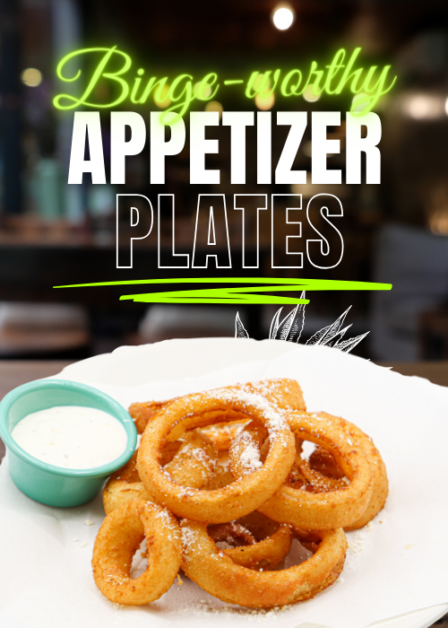 Crispy onion rings with a side of ranch on a white plate